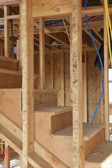 Wooden steps of incomplete house under construction