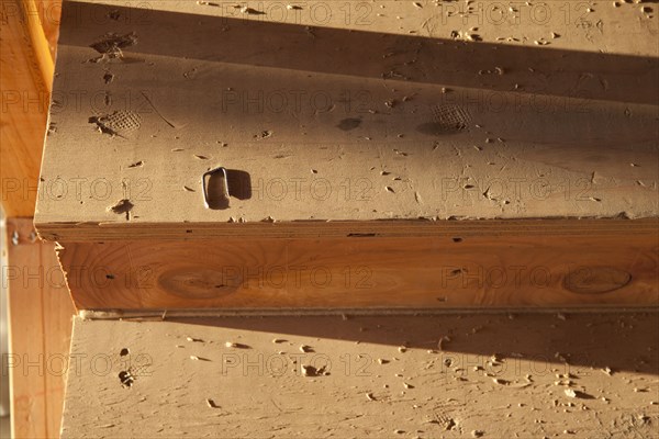 Close-up of wooden steps at construction