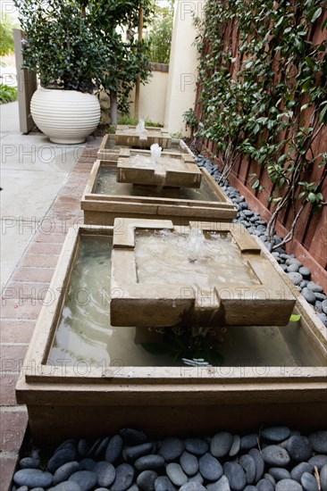 Fountains outside house