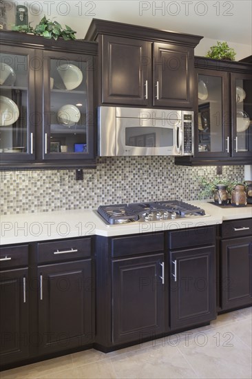 Wooden cabinets in domestic kitchen