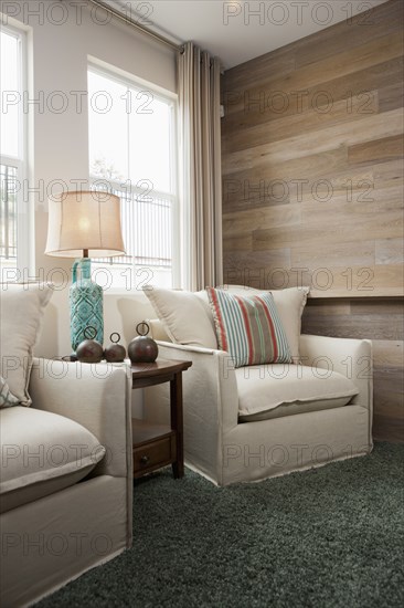 Arm chairs and side table in living room