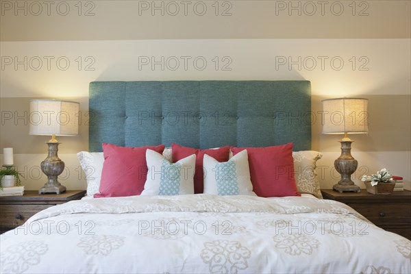 Interior of bedroom with night tables