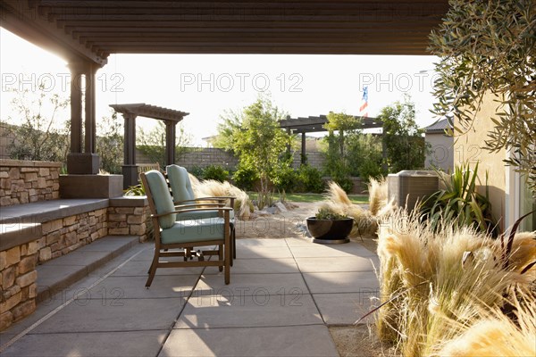 Chairs and plants in outdoor sitting area