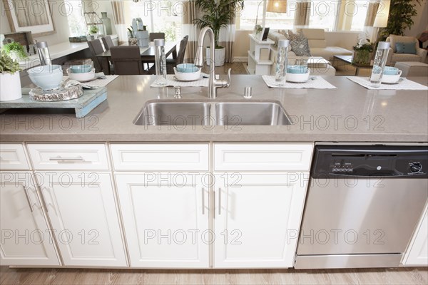 Crockeries arranged at kitchen island