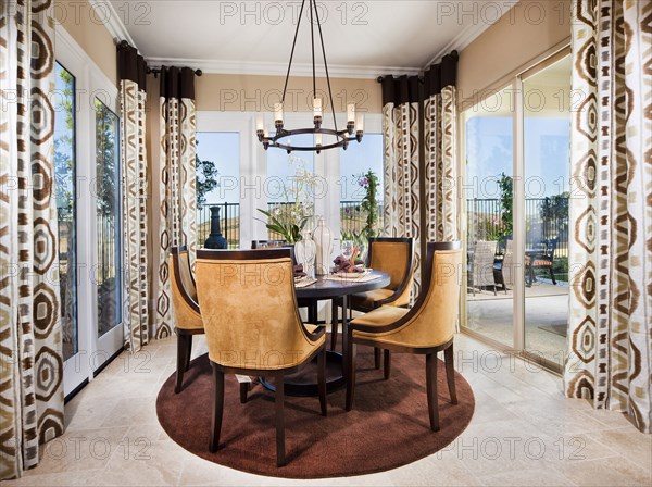 Interior of dining table and chairs in house