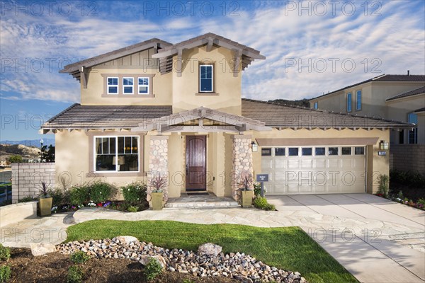 Two story house with driveway