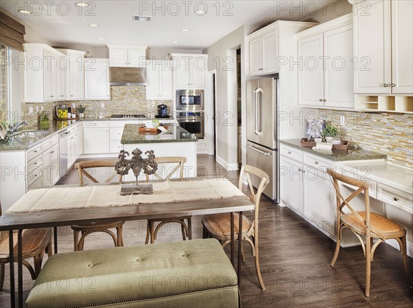 Open plan of dining area and kitchen