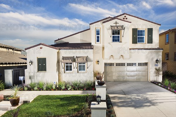 Two story house with driveway