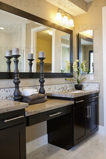 Interior of domestic bathroom with candlestick holders