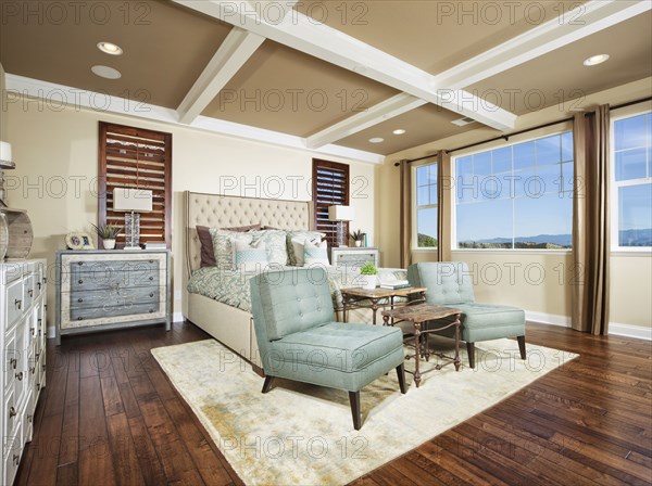 Seating area at the foot of master bedroom