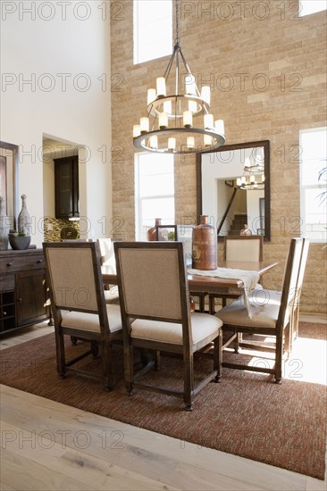 Chandelier above dining table