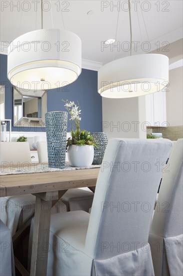 Pendant lights above dining table