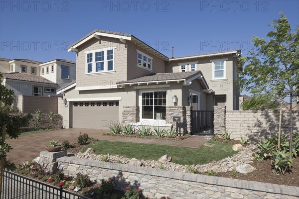 Exterior of two story house and driveway