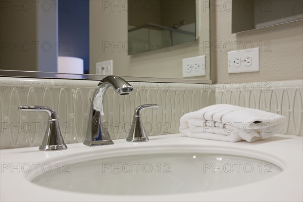 Faucet and sink in domestic bathroom