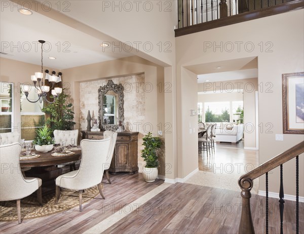 Interior of dining area and front entrance of house