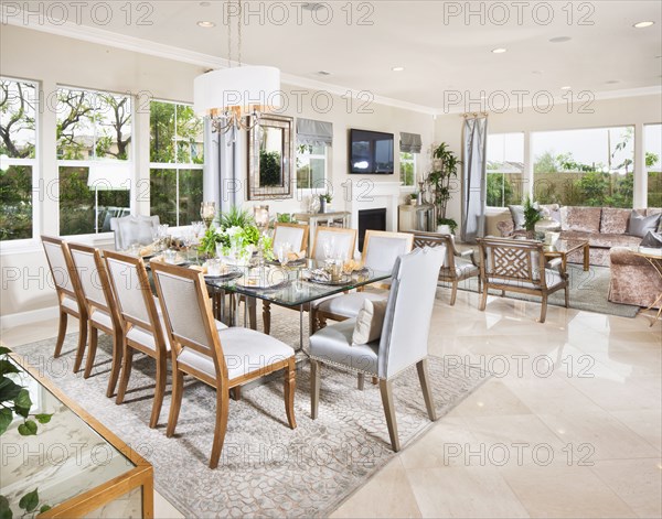 Split-level open plan dining room and sitting area at home