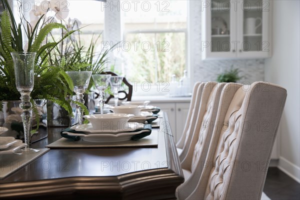 Close-up of place setting on dining table at home