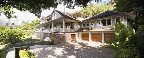 Front exterior contemporary Hawaiian home