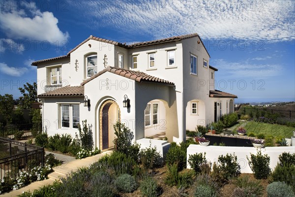 Front and side exterior modern spanish style home