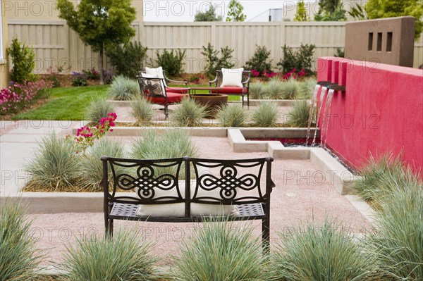 Back patio with contemporary fountain