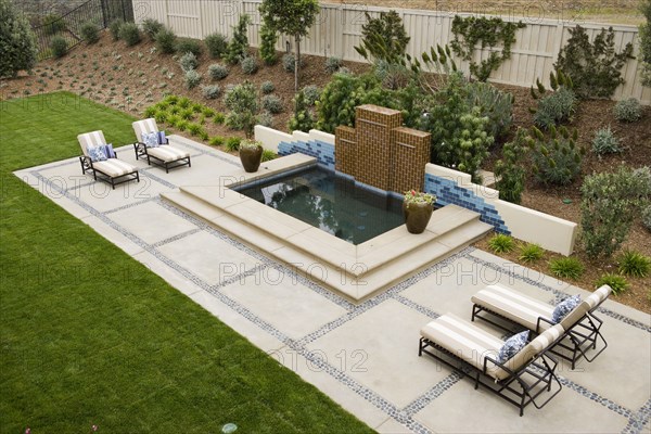 Back patio with contemporary fountain