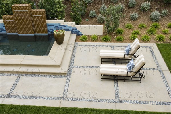 Back patio with contemporary fountain