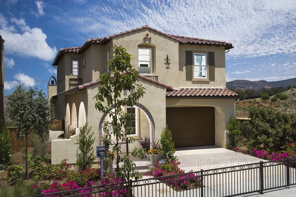 Front exterior Mediterranean style home