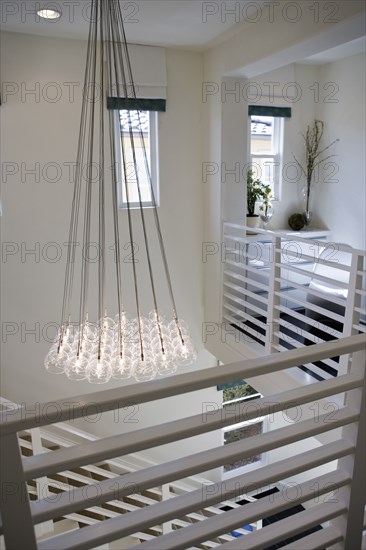 Hanging light bulbs of contemporary chandelier