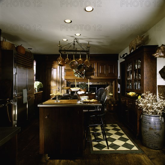 Interior of a contemporary kitchen with arranged cooking island