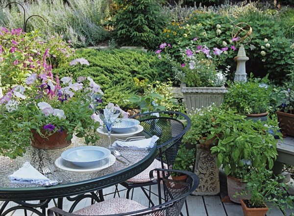 Partial view of table set with dishes on deck