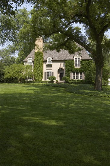 Ivy covered French Normandy style home