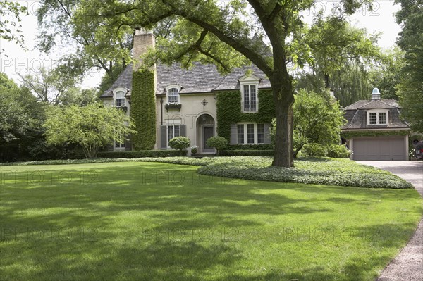 Ivy covered French Normandy style home