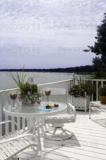 Upper third story deck overlooking lake