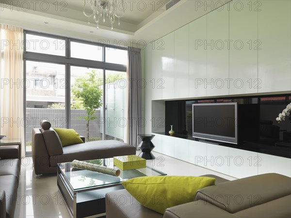 Modern living room with lime green accents