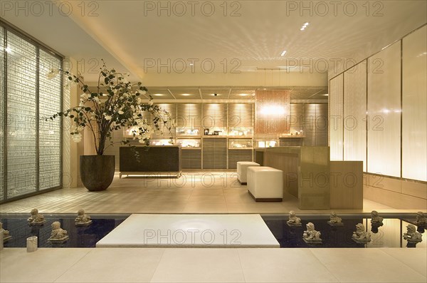 Modern lobby with collection of foo dog sculptures