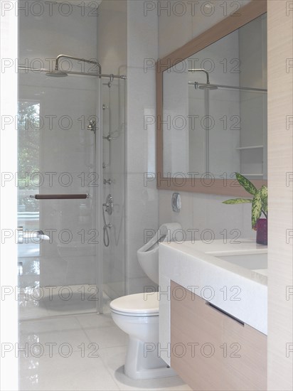 Small modern bathroom with glass shower