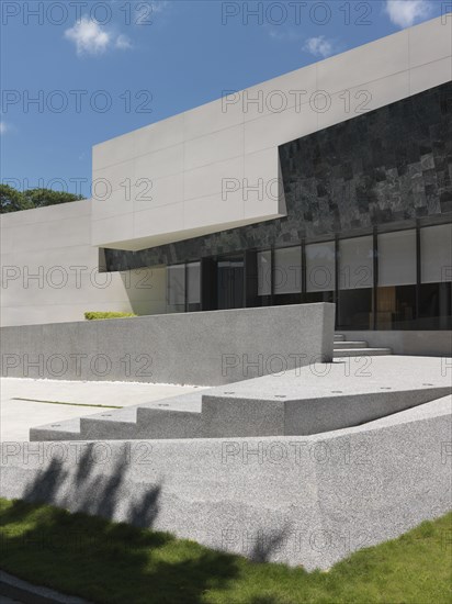 Stone staircase leading to modern building