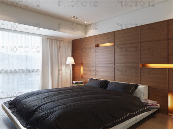 Black and white modern bedroom with platform bed