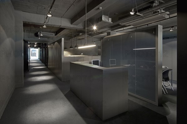 Carpeted hallway in modern office