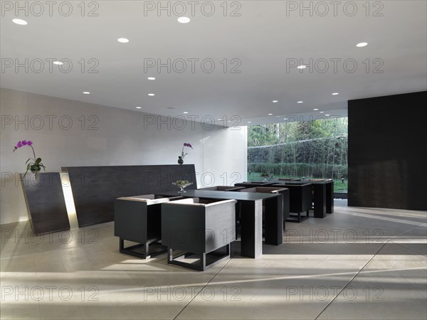 Modern dining area with recessed lighting