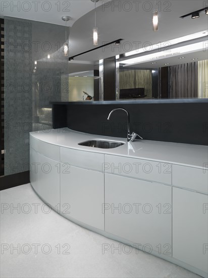 Modern wet bar with pendant lights