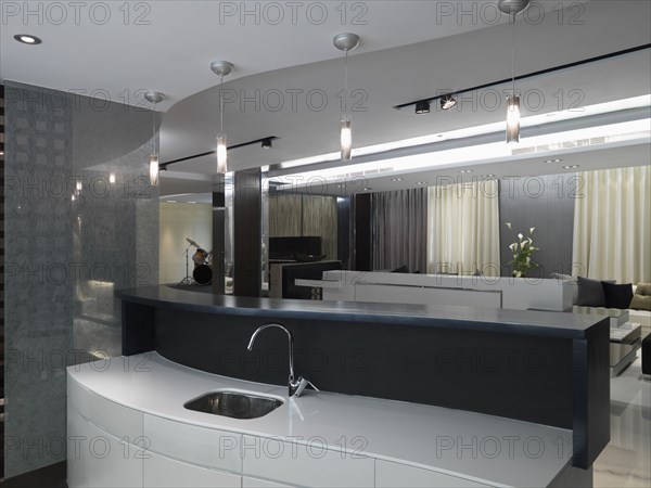 Modern wet bar with pendant lights