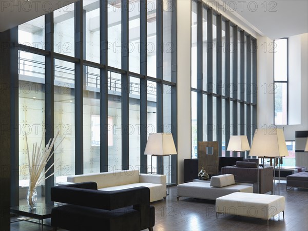 Sitting area with high ceilings and modern furniture