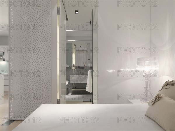 White bedroom and bathroom