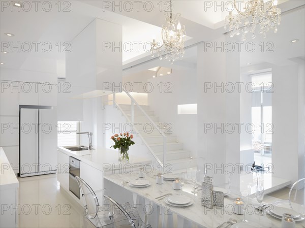 Marble dining area connected to kitchen