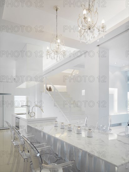 Marble dining area connected to kitchen