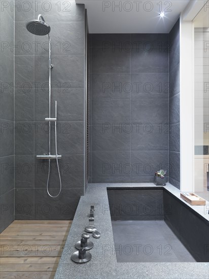 Modern black slate bathtub and shower