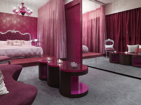 Elegant pink and red master bedroom