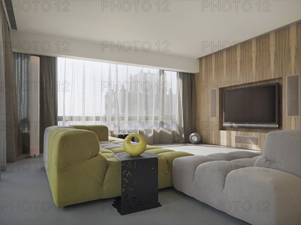 Living room with green and white sectional sofa