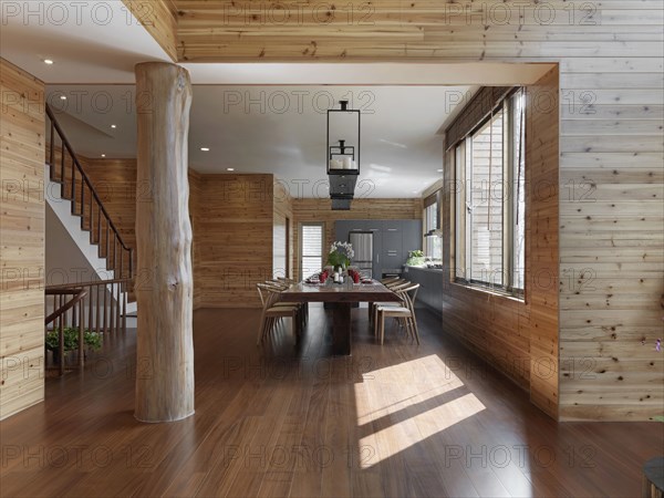 Large wooden dining table in cabin home